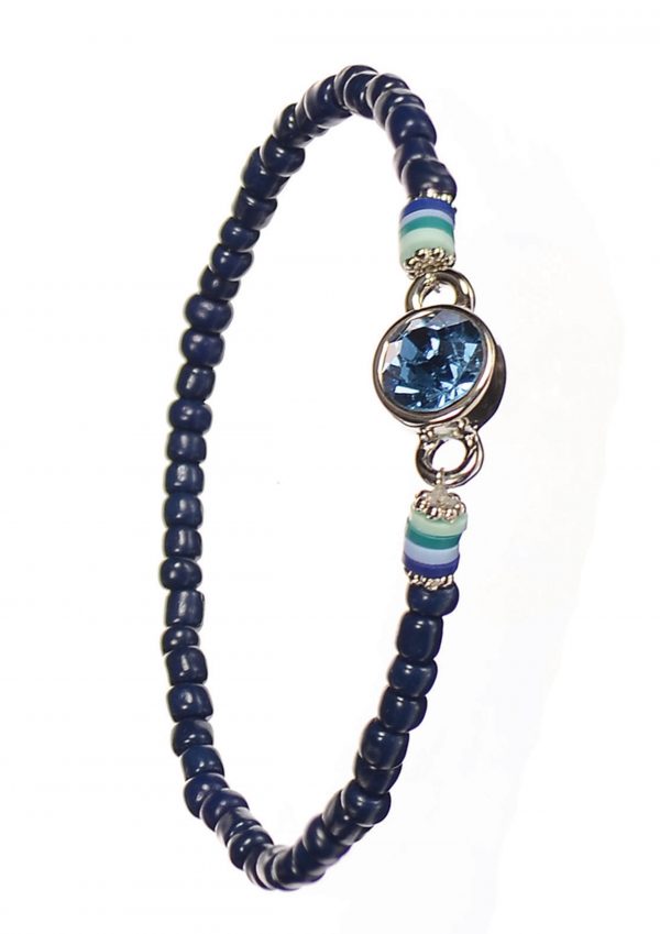 This Navy Crystal Row Bead Bracelet features a lovely row of Navy crystals with a sapphire gemstone to contrast.